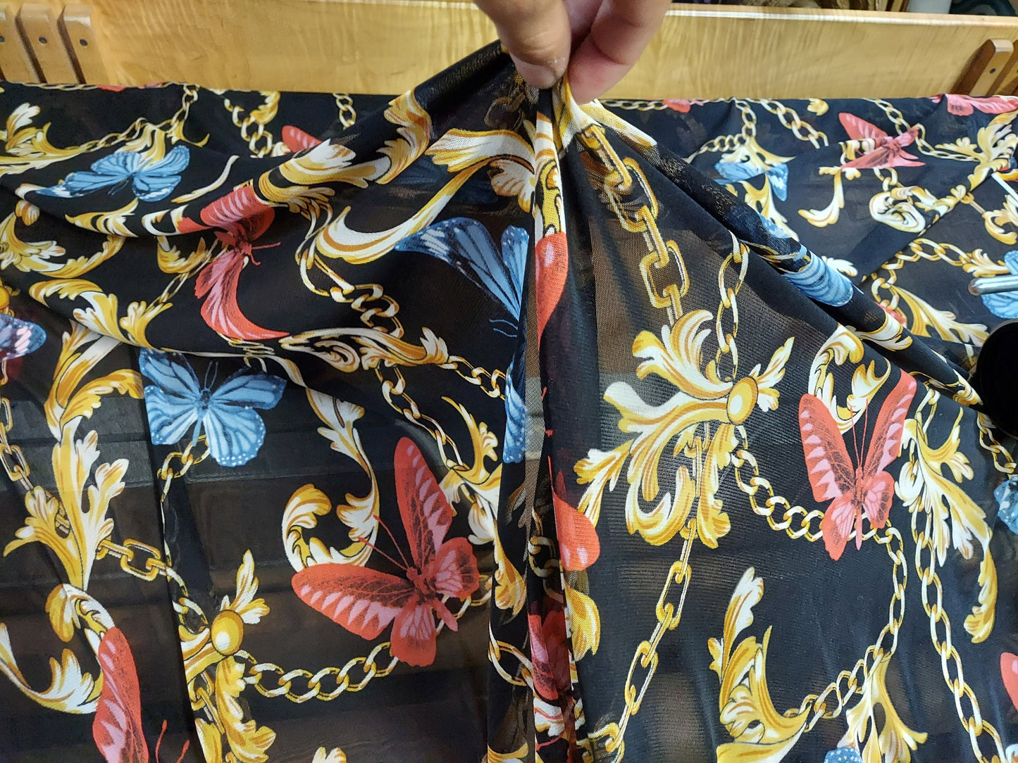 ad Power Mesh New chains with butterflies print on 4-way stretch mesh 58” Sold by the yard