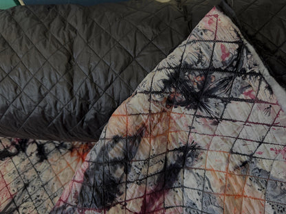 Double-Faced Reversible Pre-Quilted  Black/Camouflage color, Fabric. 54" wide, l 100% / polyester Fabric by The Yard