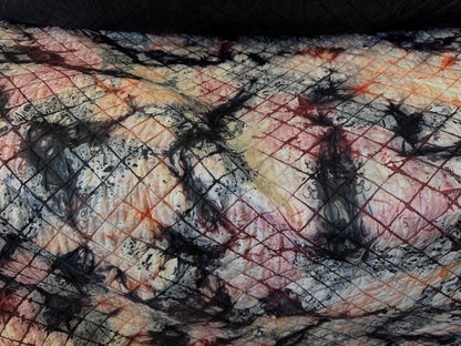 Double-Faced Reversible Pre-Quilted  Black/Camouflage color, Fabric. 54" wide, l 100% / polyester Fabric by The Yard