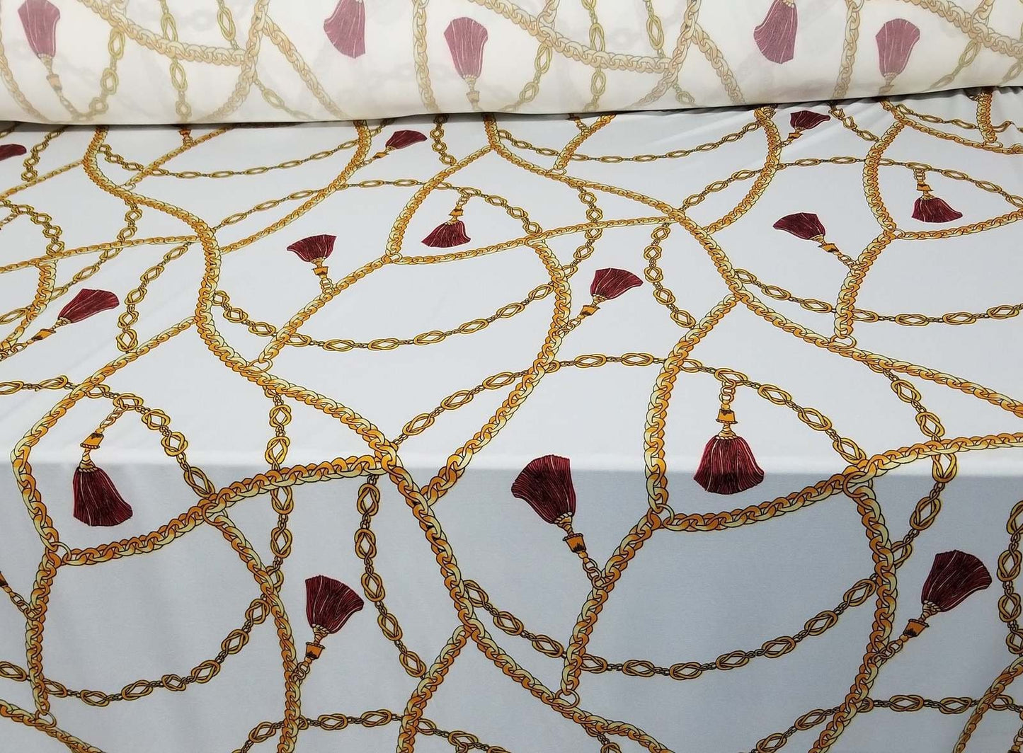 2 Way Stretch Scuba Techno, Color white/gold Chains, Belts and Ornaments burgundy, 58" wide, sold by yard in continuous yards