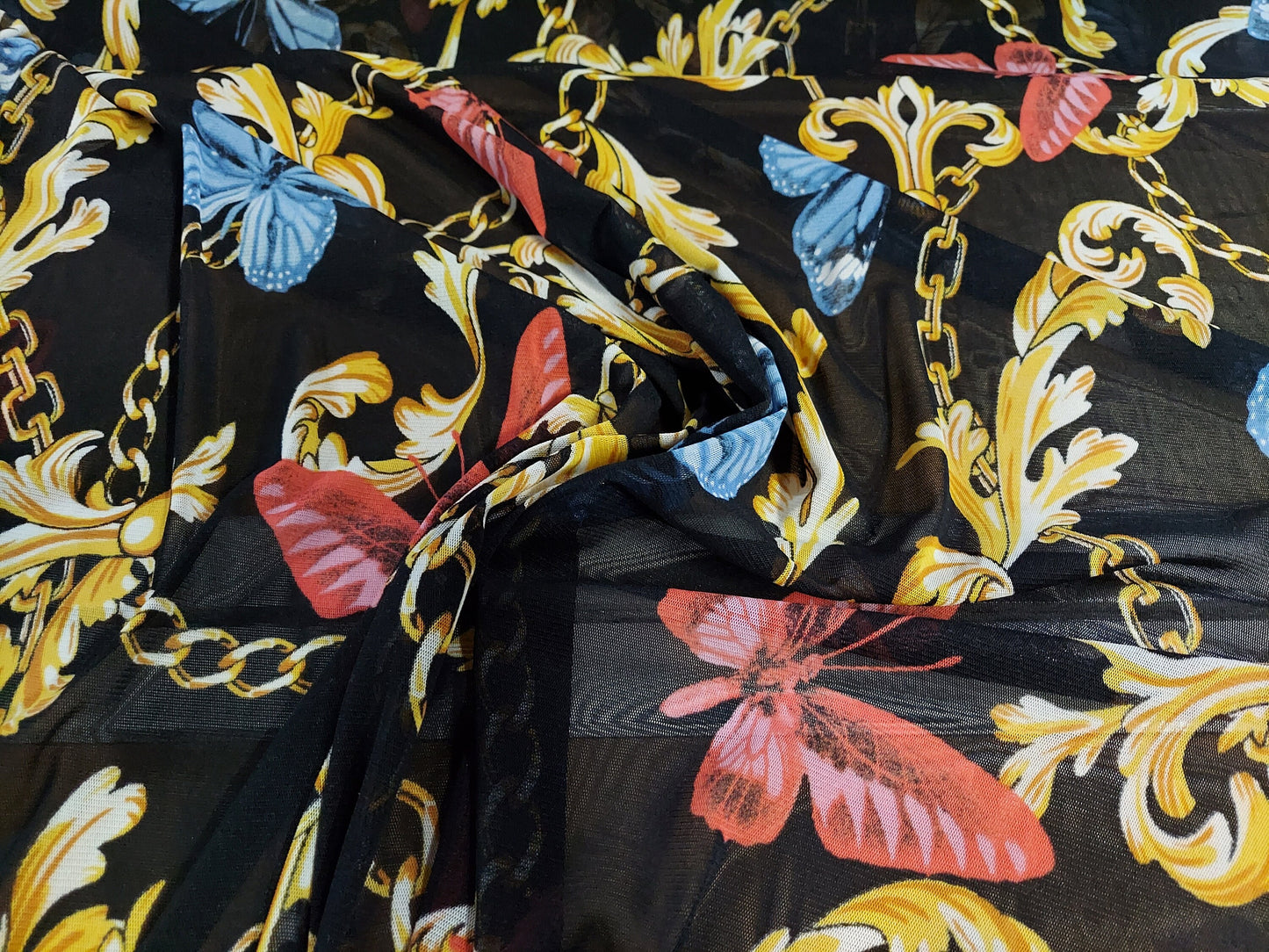 ad Power Mesh New chains with butterflies print on 4-way stretch mesh 58” Sold by the yard