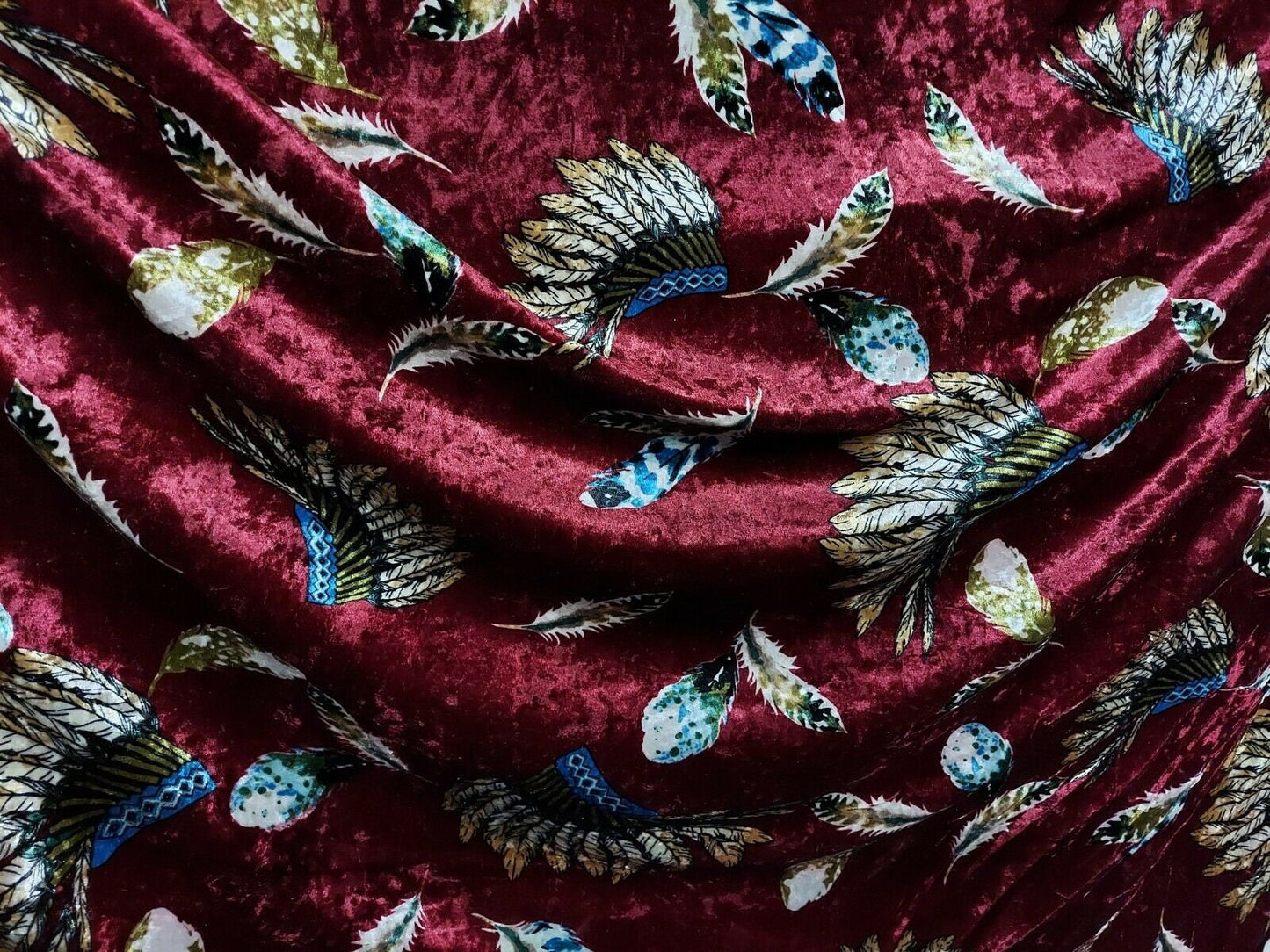 ad crushed velvet Burgandy war bonnets feathers print sold by yard ''58'' inches wide