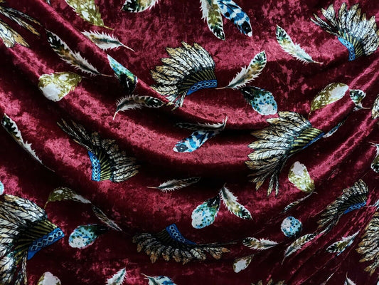 ad crushed velvet Burgandy war bonnets feathers print sold by yard ''58'' inches wide